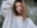 Selfie in a white sweater