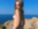 Sofia is naked on the beach ))