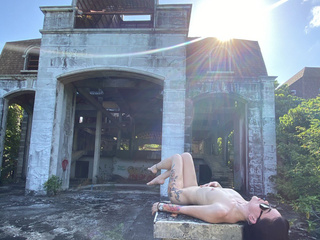 Naked in an abandoned hotel